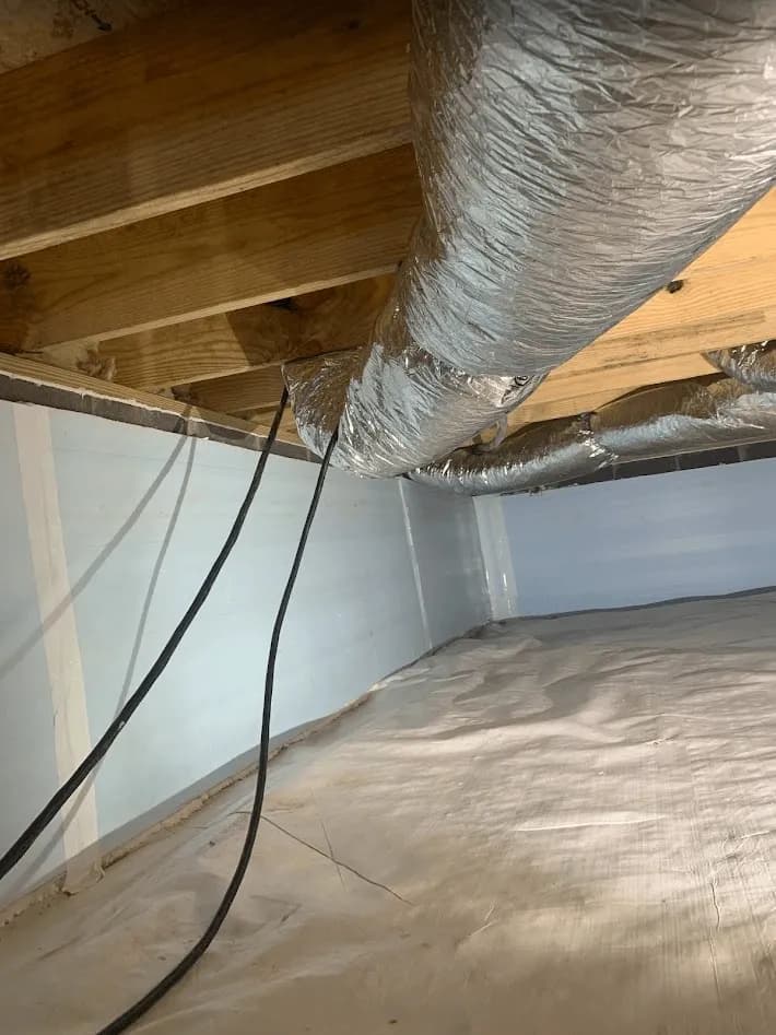 Completed Elite crawlspace encapsulation with wall liner and ground vapor barrier